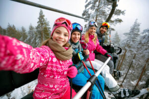 A family skiing on a winter vacation to Hood River, Oregon.